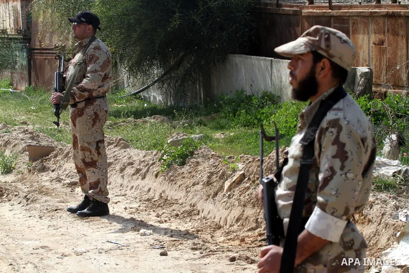 Members of Palestinian security forces stand guard on the border between Egypt and southern Gaza Strip, in Rafah on March 5, 2015. Gaza's border crossings will be reopened once control of them is handed over to the Pales...