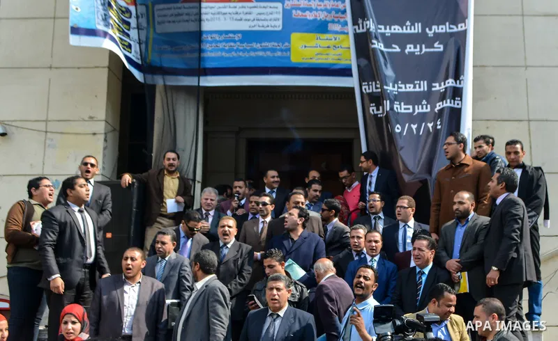 Egyptian lawyers shout slogans against the Interior Ministry during a protest in front of the Lawyers' Syndicate headquarters in Cairo, March 05, 2015, after the death of lawyer Karim Hamdy in the Police Department last...