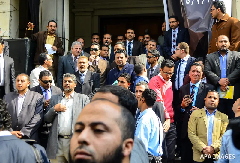 Egyptian lawyers shout slogans against the Interior Ministry during a protest in front of the Lawyers' Syndicate headquarters in Cairo, March 05, 2015, after the death of lawyer Karim Hamdy in the Police Department last...