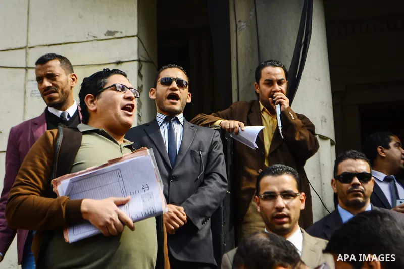 Egyptian lawyers shout slogans against the Interior Ministry during a protest in front of the Lawyers' Syndicate headquarters in Cairo, March 05, 2015, after the death of lawyer Karim Hamdy in the Police Department last...