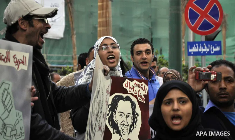 Egyptian demonstrators shout slogans during a demonstration in Cairo on March 05, 2015 protesting the killing of Shaima al-Sabbagh. Al-Sabbagh who was killed in clashes with Egyptian police during a rare leftwing protest...