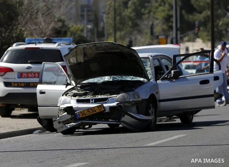 The car that ploughed into pedestrians in Jerusalem injuring several people, before its driver got out and tried to stab them is seen after an attack mirroring similar incidents last year, on March 6, 2015. The incident...