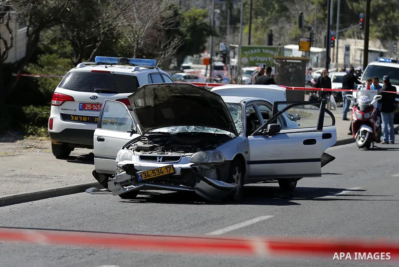 The car that ploughed into pedestrians in Jerusalem injuring several people, before its driver got out and tried to stab them is seen after an attack mirroring similar incidents last year, on March 6, 2015. The incident...