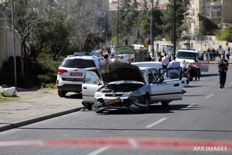 The car that ploughed into pedestrians in Jerusalem injuring several people, before its driver got out and tried to stab them is seen after an attack mirroring similar incidents last year, on March 6, 2015. The incident...