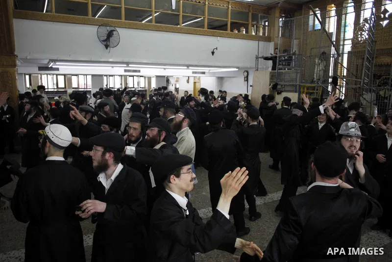 Ultra-Orthodox Jewish men dance at their Yeshiva during celebrations marking the Jewish holiday of Purim in Jerusalem's Mea Shearim neighbourhood March 6, 2015. Purim is a celebration of the Jews' salvation from genocide...
