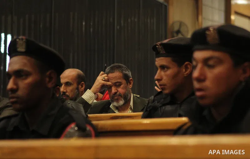 Relative of a killed men in the 'Port Said Massacre' attend a trial of suspects in Cairo on March 7, 2015. Port said Criminal court adjourned the so-called Case “Port Said Massacre” retrial to Tomorrow . The defendants w...