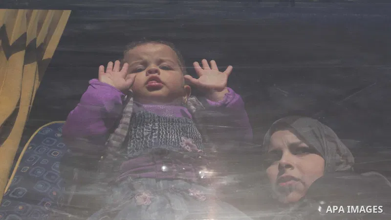 Palestinians wait to cross into Egypt, at the Rafah crossing between Egypt and the southern Gaza Strip March 9, 2015. Egyptian authorities opened the Rafah border crossing on Monday for two days, officials said. Rafah is...