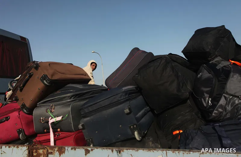 Palestinians wait to cross into Egypt, at the Rafah crossing between Egypt and the southern Gaza Strip March 9, 2015. Egyptian authorities opened the Rafah border crossing on Monday for two days, officials said. Rafah is...