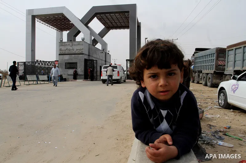 Palestinians wait to cross into Egypt, at the Rafah crossing between Egypt and the southern Gaza Strip March 10, 2015. Egyptian authorities opened the Rafah border crossing on Monday for two days, officials said. Rafah i...