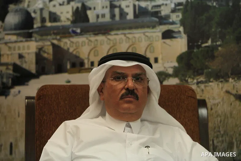 Qatar's Ambassador to the Palestinian Authority, Mohammed Al Emadi mets with Senior Hamas leader Ismail Haniyeh (not seen) at his home, in Gaza city, on March 12, 2015. Photo by Ashraf Amra
