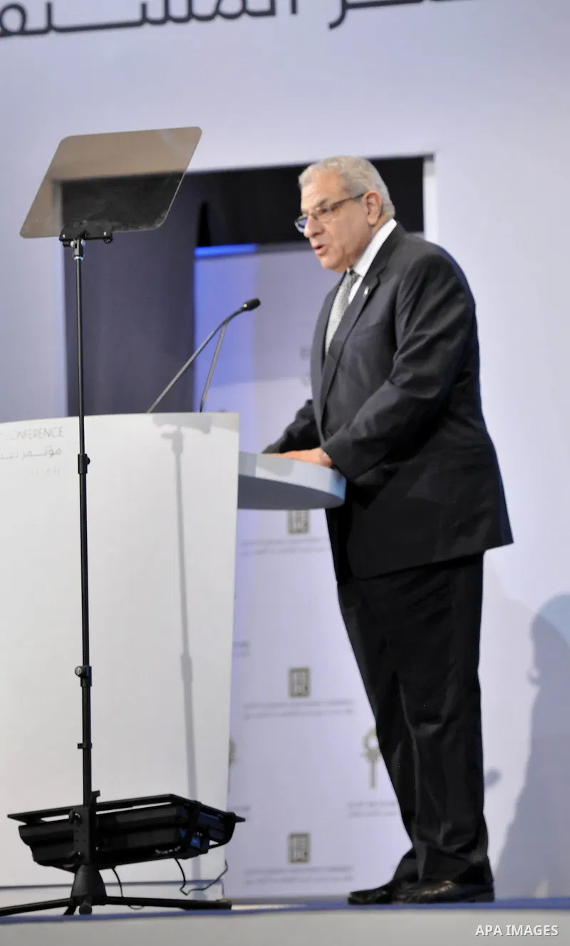 Egyptian Prime Minister Ibrahim Mehleb speaks during the Egypt Economic Development Conference (EEDC) in Sharm el-Sheikh, in the South Sinai governorate, south of Cairo, March 14, 2015. Gulf Arab allies pledged a further...