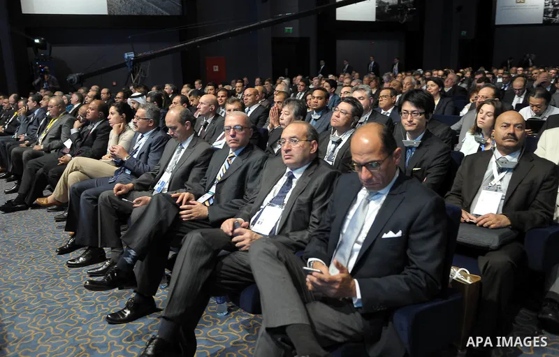 Delegates listen as Egyptian Prime Minister Ibrahim Mehleb speaks during the Egypt Economic Development Conference (EEDC) in Sharm el-Sheikh, in the South Sinai governorate, south of Cairo, March 14, 2015. Gulf Arab alli...