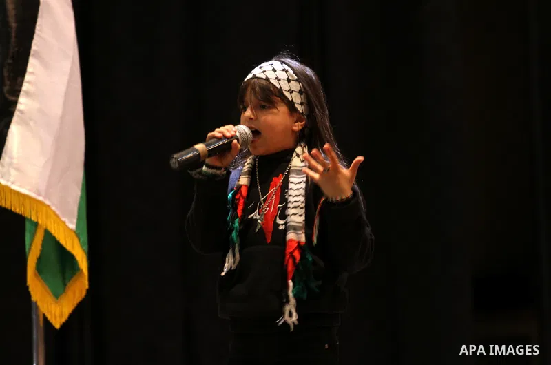 Palestinians take part during a ceremony of the Palestinian accountant Day in Gaza city on March 19, 2015. Photo by Mohammed Asad