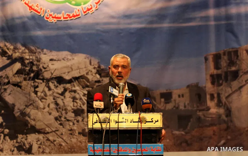 Senior Hamas leader Ismail Haniyeh speaks during a ceremony of the Palestinian accountant Day in Gaza city on March 19, 2015. Photo by Mohammed Asad