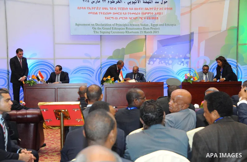 A handout picture made available by the Office of the Egyptian Presidency shows the Egyptian President, Abdel Fattah al-Sisi, the Sudanese President, Omar al-Bashir, and the Prime Minister of Ethiopia, Hailemariam Desale...