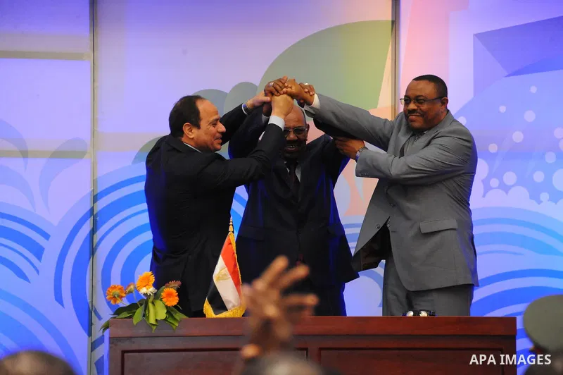 A handout picture made available by the Office of the Egyptian Presidency shows the Egyptian President, Abdel Fattah al-Sisi, the Sudanese President, Omar al-Bashir, and the Prime Minister of Ethiopia, Hailemariam Desale...