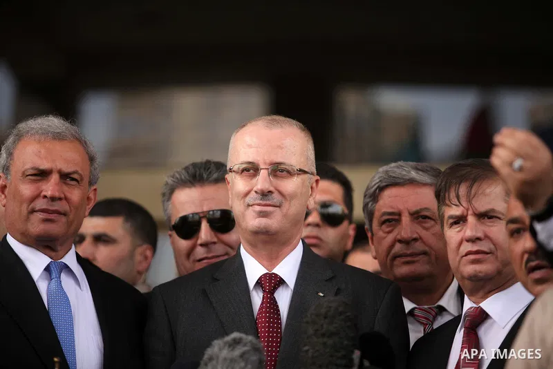 Palestinian Prime Minister Rami Hamdallah speaks during a press conference in Gaza City March 25, 2015. Hamdallah, who arrived to Gaza on Wednesday, urged donor countries to fulfill their financial obligations for the re...