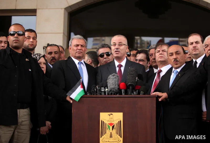 Palestinian Prime Minister Rami Hamdallah speaks during a press conference in Gaza City March 25, 2015. Hamdallah, who arrived to Gaza on Wednesday, urged donor countries to fulfill their financial obligations for the re...