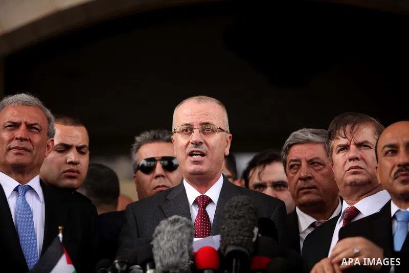 Palestinian Prime Minister Rami Hamdallah speaks during a press conference in Gaza City March 25, 2015. Hamdallah, who arrived to Gaza on Wednesday, urged donor countries to fulfill their financial obligations for the re...