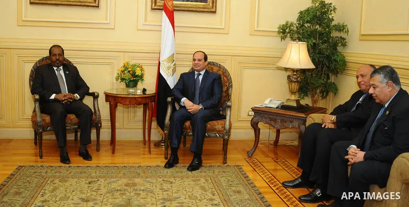 A handout picture made available by the Egyptian presidency shows Egyptian President Abdel Fattah al-Sisi (R) meeting with Somali President Hassan Sheikh Mohamud upon the latter's arrival in Red Sea resort of Sharm El-Sh...
