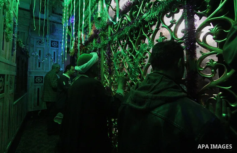 Egyptian worshippers attend a Mawlid Nafisa, a religious celebration marking the birthday of the granddaughter of the Prophet Muhammad, in Cairo, Egypt, on March 27, 2015. Photo by Amr Sayed