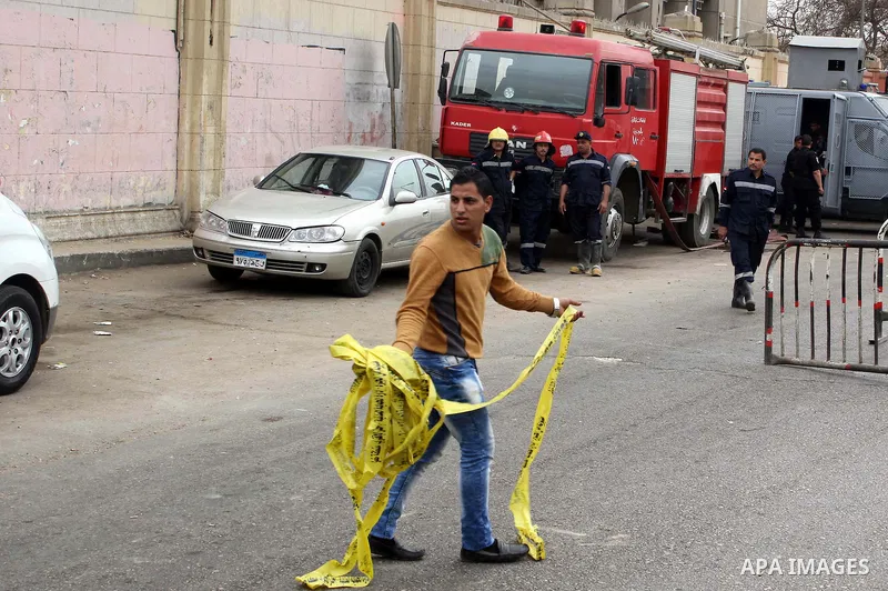 Egyptian security forces inspect the site after a bomb exploded outside the main gate of Cairo University, in Cairo, on march 28 , 2015. Eight people were injured during the explosion and sent to nearby hospitals, Health...