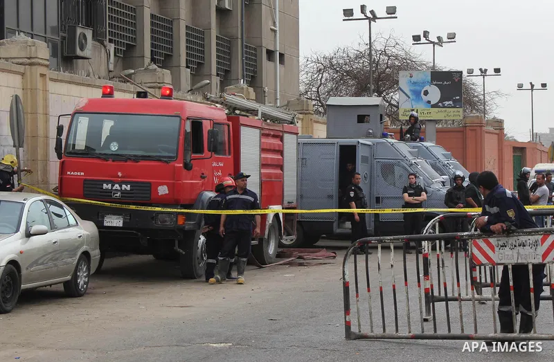 Egyptian security forces inspect the site after a bomb exploded outside the main gate of Cairo University, in Cairo, on march 28 , 2015. Eight people were injured during the explosion and sent to nearby hospitals, Health...
