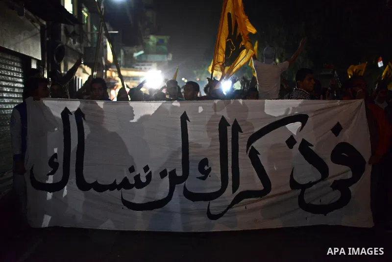 Egyptian students who support ousted President Mohamed Morsi and the Muslim Brotherhood take part in a demonstration in El-Sharabia in Cairo on March 28, 2015. Photo by Amr Sayed