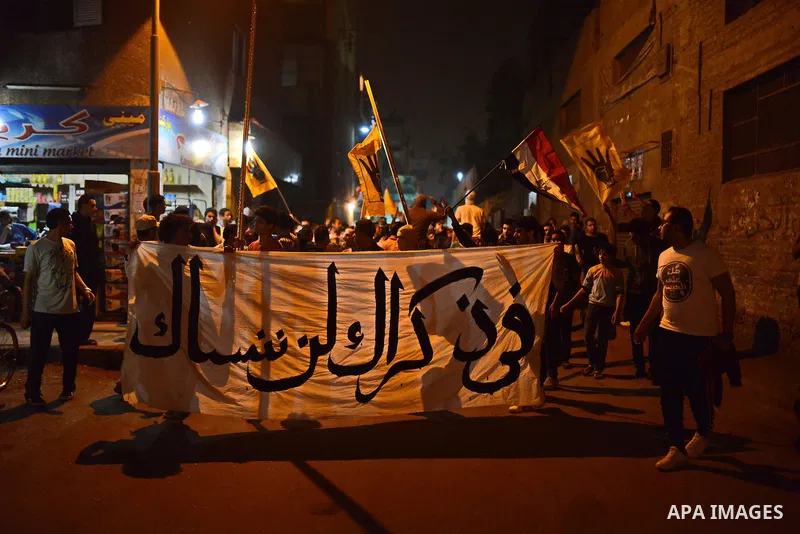 Egyptian students who support ousted President Mohamed Morsi and the Muslim Brotherhood take part in a demonstration in El-Sharabia in Cairo on March 28, 2015. Photo by Amr Sayed