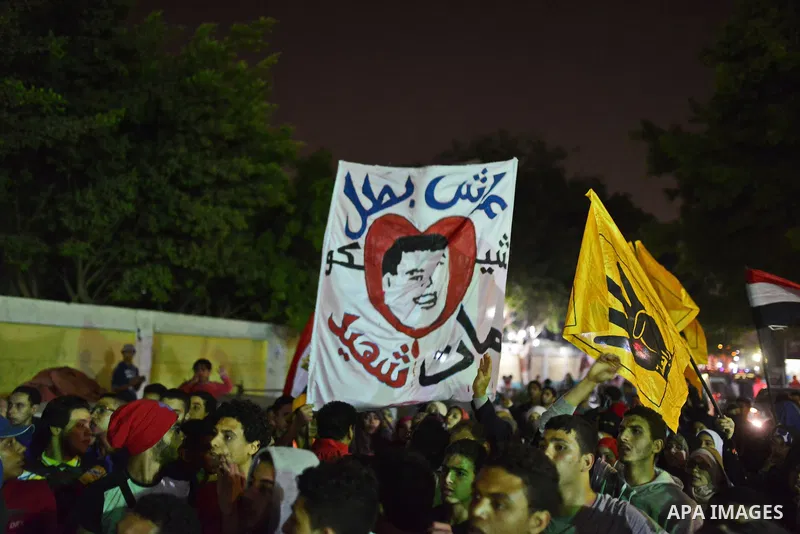 Egyptian students who support ousted President Mohamed Morsi and the Muslim Brotherhood take part in a demonstration in El-Sharabia in Cairo on March 28, 2015. Photo by Amr Sayed