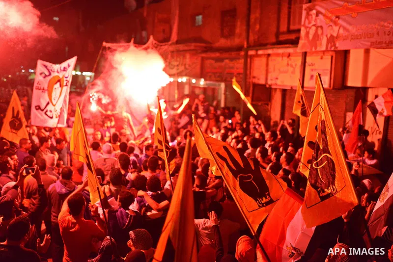 Egyptian students who support ousted President Mohamed Morsi and the Muslim Brotherhood take part in a demonstration in El-Sharabia in Cairo on March 28, 2015. Photo by Amr Sayed