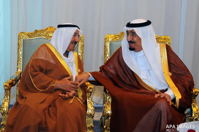 Emir of Kuwait Sheikh Sabah al-Ahmad al-Sabah (L) speaks with Saudi King Salman bin Abdulaziz al-Saud during the 26th Arab Summit in Sharm al-Sheikh, in the South Sinai governorate, south of Cairo, March 28, 2015. Arab L...