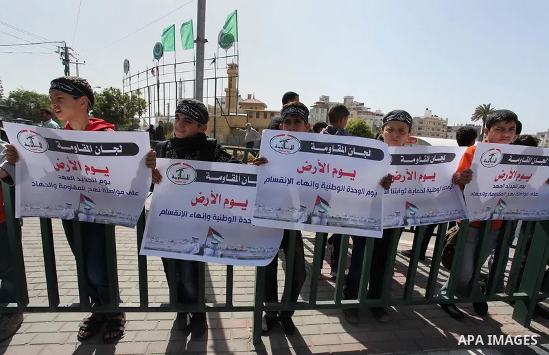 Protester factions take part in a rally marking Land Day in Gaza City March 30, 2015.The annual demonstrations mark the deaths of six Arab Israeli protesters at the hands of Israeli police and troops during mass protests...