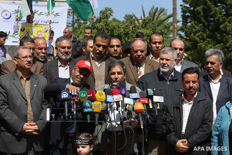 Protester factions take part in a rally marking Land Day in Gaza City March 30, 2015.The annual demonstrations mark the deaths of six Arab Israeli protesters at the hands of Israeli police and troops during mass protests...