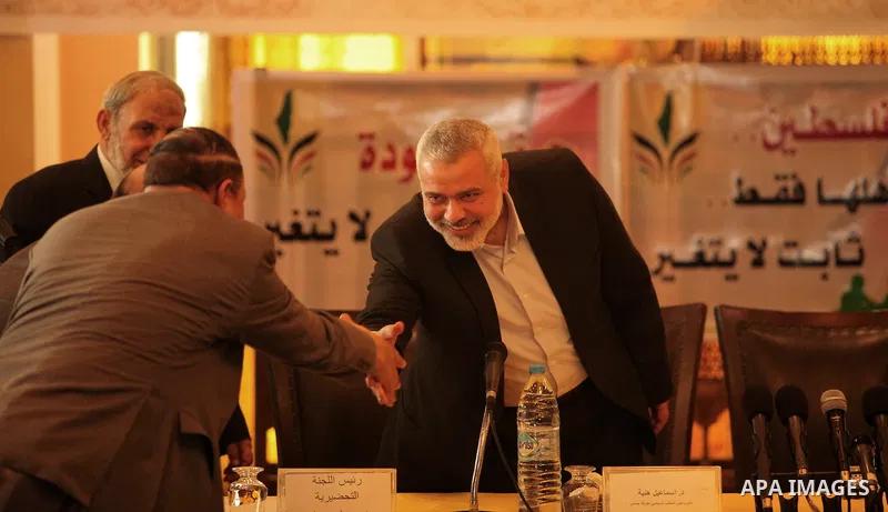 Senior Hamas leader Ismail Haniyeh attends the 9th National Congress to preserve the Palestinian constants, and to mark the Palestinian Land Day, in Gaza city on March 30, 2015. Photo by Ashraf Amra