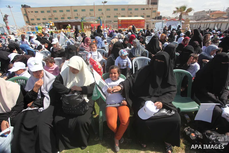 Palestinian orphans attend a ceremony to mark the Orphan Day, in Gaza city, on April 2, 2015. Photo by Ashraf Amra