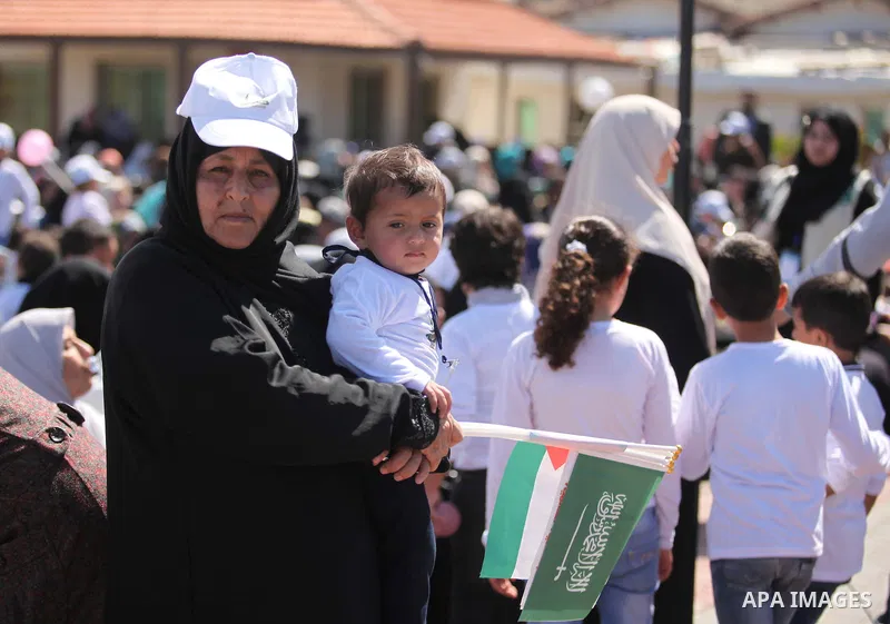 Palestinian orphans attend a ceremony to mark the Orphan Day, in Gaza city, on April 2, 2015. Photo by Ashraf Amra