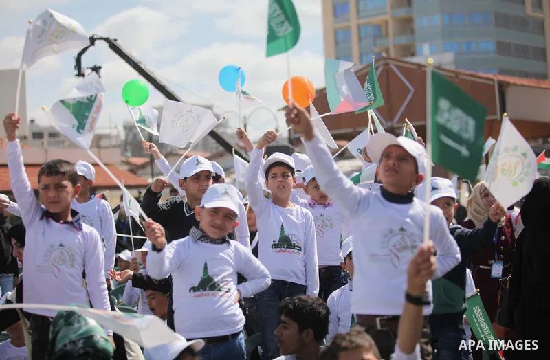 Palestinian orphans attend a ceremony to mark the Orphan Day, in Gaza city, on April 2, 2015. Photo by Ashraf Amra