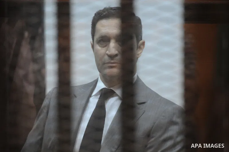 Alaa Mubarak, the son of former Egyptian President Hosni Mubarak, is seen inside the court in Cairo, Egypt, on April 4, 2015. An Egyptian court began a retrial on Saturday of former president Hosni Mubarak and his sons f...