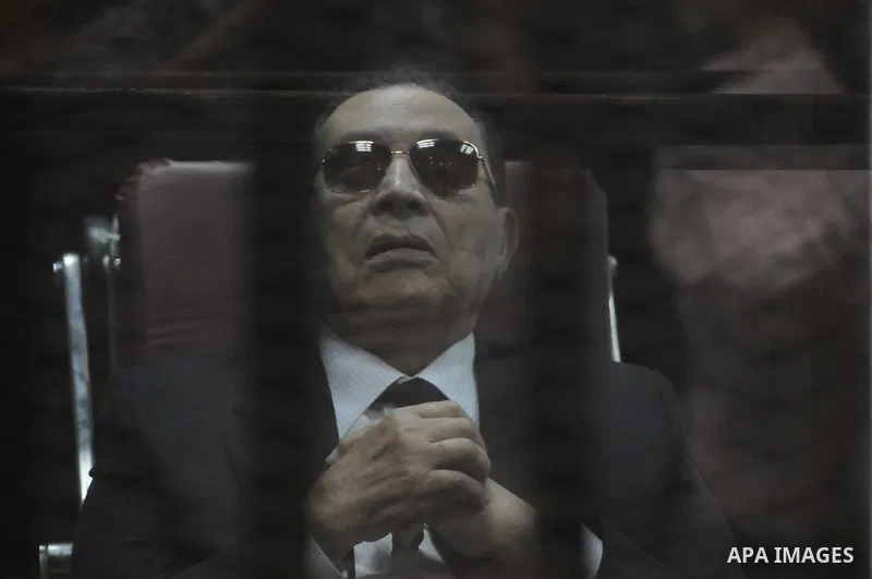 Egypt's former president Hosni Mubarak is seen inside the court in Cairo, Egypt, on April 4, 2015. An Egyptian court began a retrial on Saturday of former president Hosni Mubarak and his sons for allegedly diverting publ...