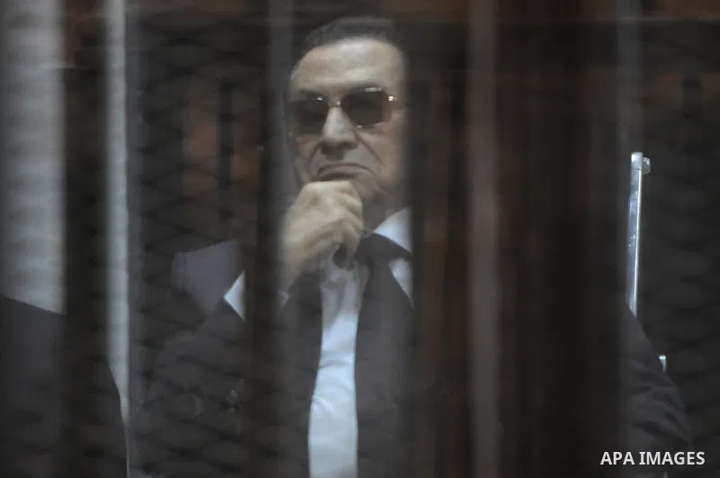 Egypt's former president Hosni Mubarak is seen inside the court in Cairo, Egypt, on April 4, 2015. An Egyptian court began a retrial on Saturday of former president Hosni Mubarak and his sons for allegedly diverting publ...