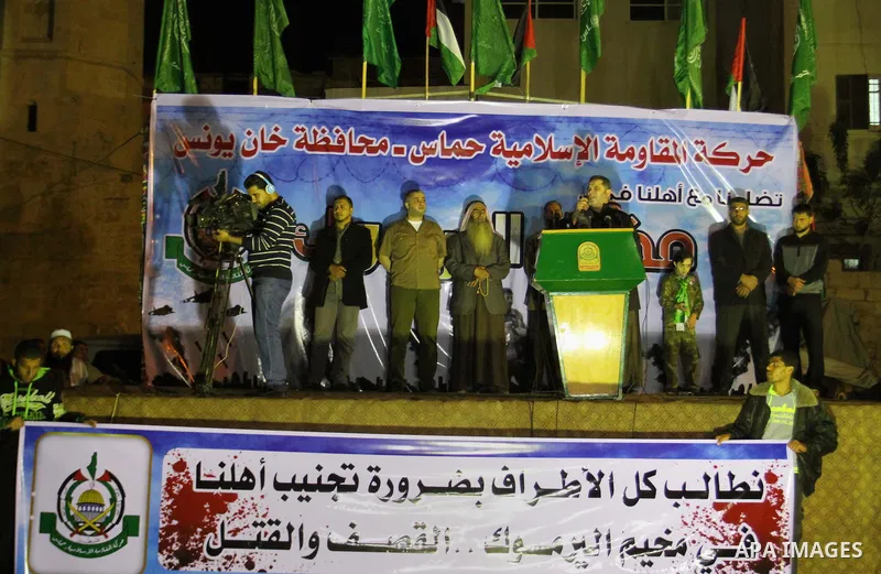 Senior Hamas leader Salah El-Bardawil, speaks during a protest to show solidarity with Palestinian refugees Syria's main refugee camp Yarmouk, in Khan Younis in southern Gaza Strip on April 04, 2015. Photo by Ramadan El-...