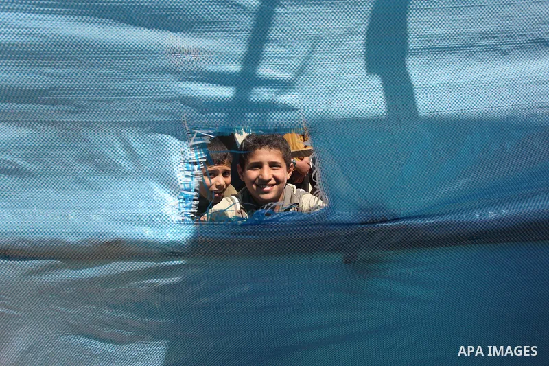 Palestinian children take part in a celebration to mark the Children's Day, at University College of Applied Sciences in Gaza city on April 5, 2015. Photo by Ashraf Amra