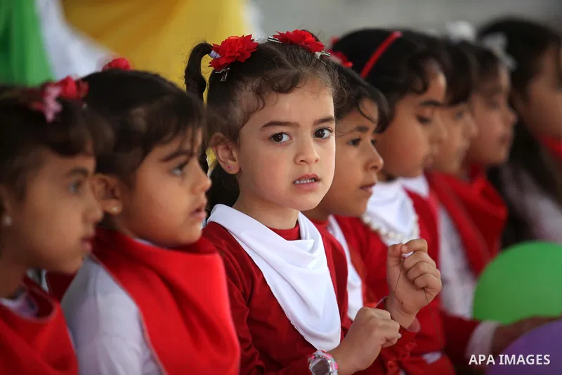 Palestinian children take part in a celebration to mark the Children's Day, at University College of Applied Sciences in Gaza city on April 5, 2015. Photo by Ashraf Amra