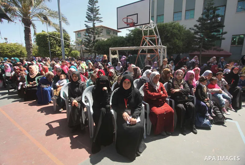 Palestinian children take part in a celebration to mark the Children's Day, at University College of Applied Sciences in Gaza city on April 5, 2015. Photo by Ashraf Amra