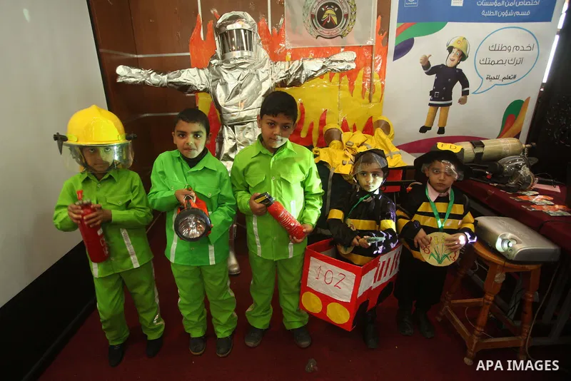 Palestinian children take part in a celebration to mark the Children's Day, at University College of Applied Sciences in Gaza city on April 5, 2015. Photo by Ashraf Amra