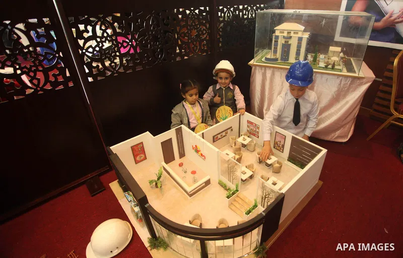 Palestinian children take part in a celebration to mark the Children's Day, at University College of Applied Sciences in Gaza city on April 5, 2015. Photo by Ashraf Amra