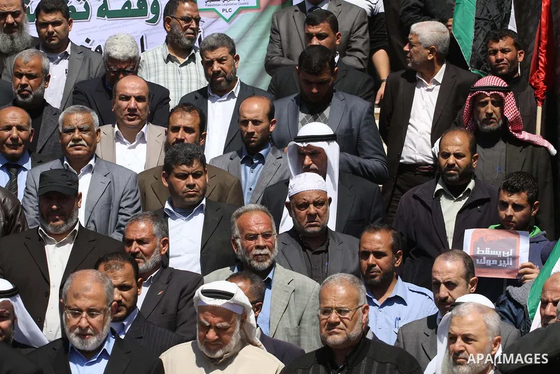 Deputies of the Legislative Council Palestinian, take part a protest to show solidarity with the Palestinians living in Syria's Yarmouk camp, which is besieged by government forces and has been largely overrun by jihadis...