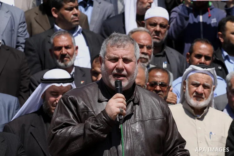 Deputies of the Legislative Council Palestinian, take part a protest to show solidarity with the Palestinians living in Syria's Yarmouk camp, which is besieged by government forces and has been largely overrun by jihadis...