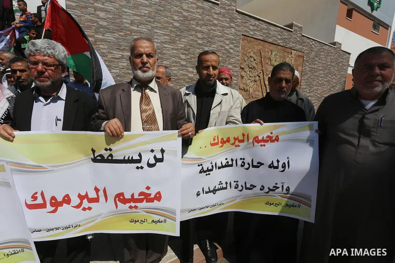Deputies of the Legislative Council Palestinian, take part a protest to show solidarity with the Palestinians living in Syria's Yarmouk camp, which is besieged by government forces and has been largely overrun by jihadis...